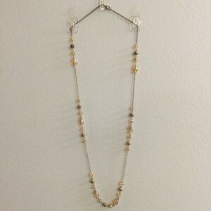2/$15 Item 19 Necklace- 34 in gold tone chain with gold beads